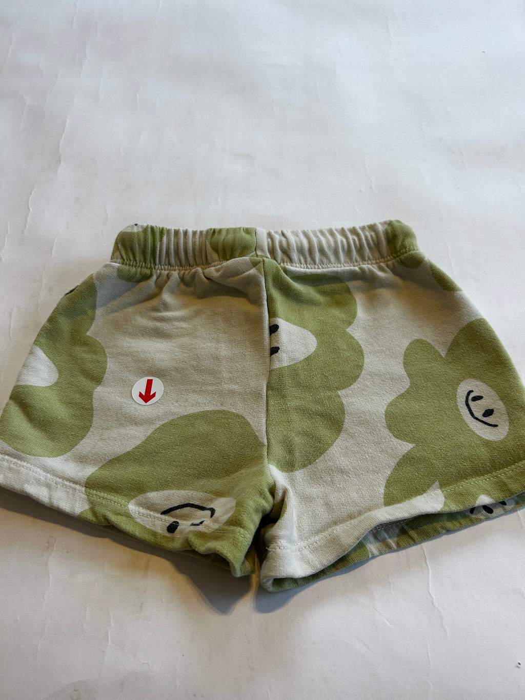 Claude & Co Green smiley splodge sweat shorts