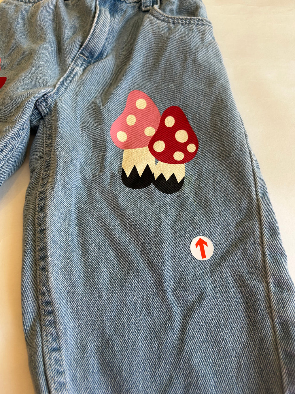 Wynken Mid wash mushroom patch jeans