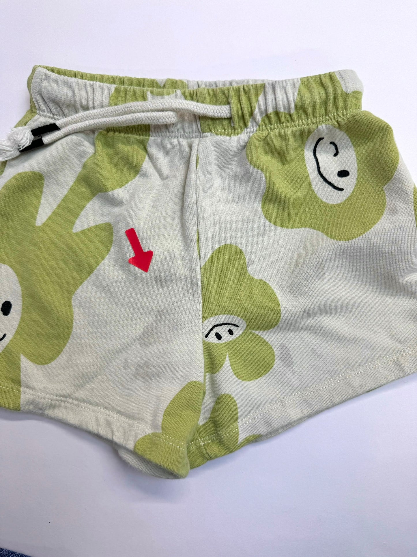 Claude and Co  Green smiley splodge sweat shorts