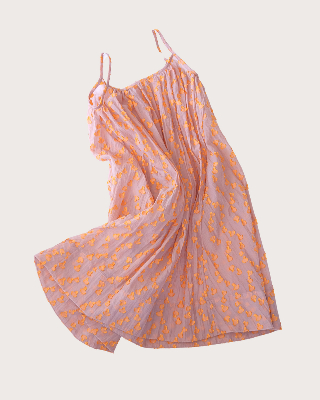 Cleo sheer dot A-line dress in pink with orange textured dots, modern unisex kidswear