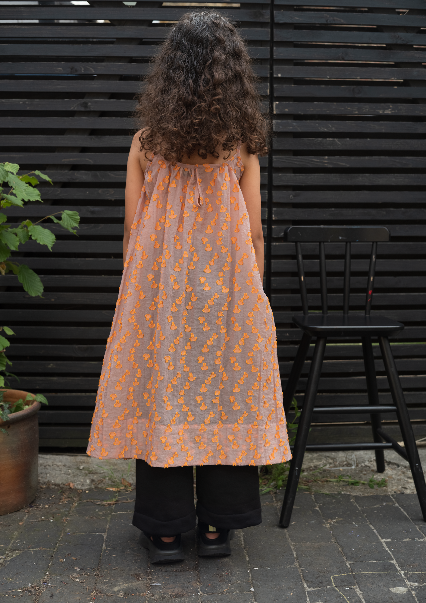 Back view of Cleo A-line dress showing adjustable shoulder straps
