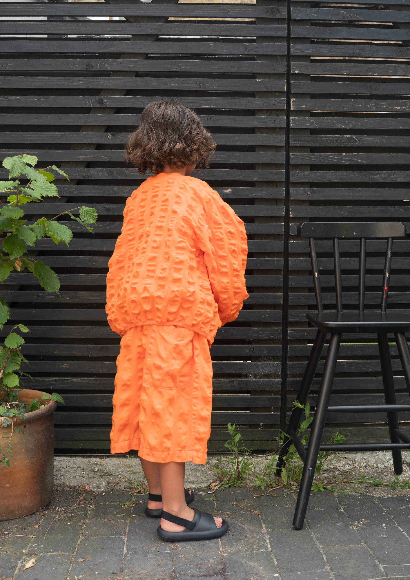Orange giant seersucker unisex kids shorts in textured organic cotton with matching jacket