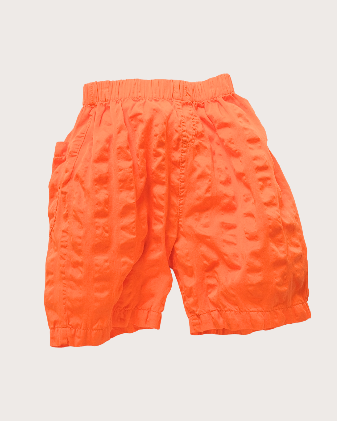 Orange giant seersucker unisex kids shorts in textured organic cotton