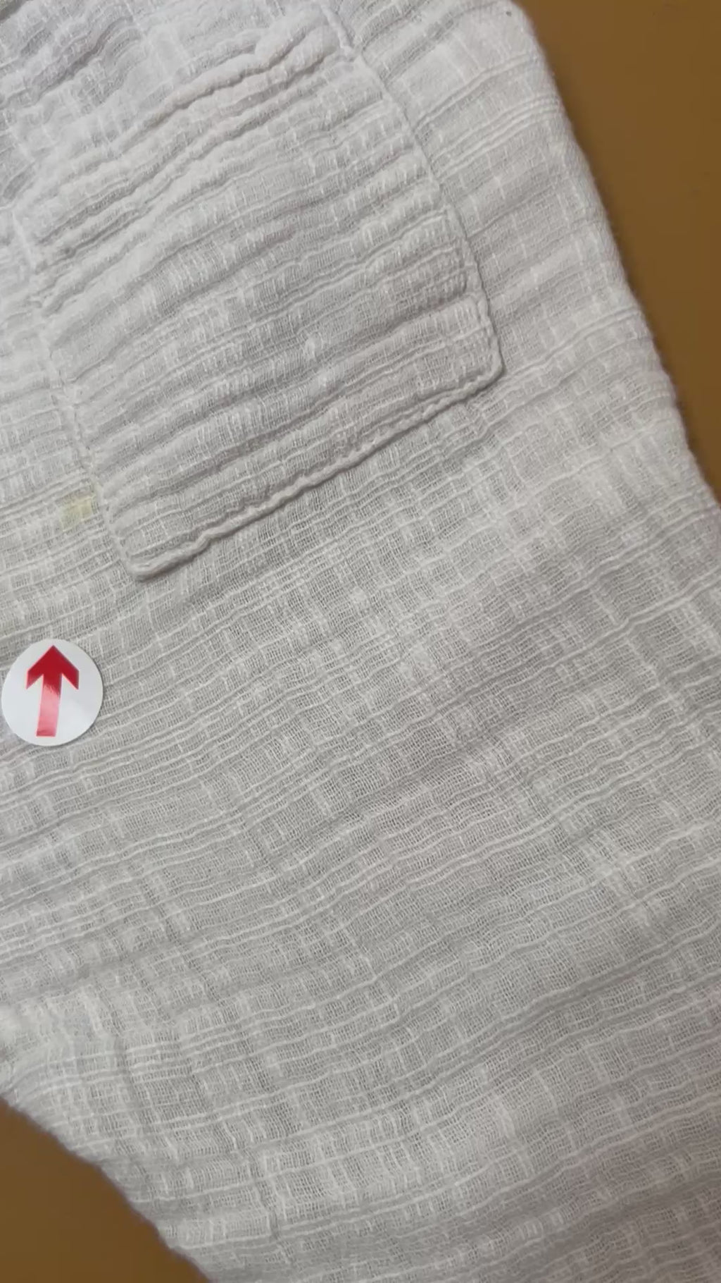 1+ in the family Textured cream trousers