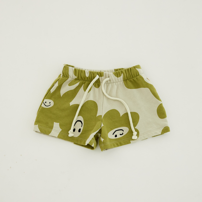 Claude and Co  Green smiley splodge sweat shorts